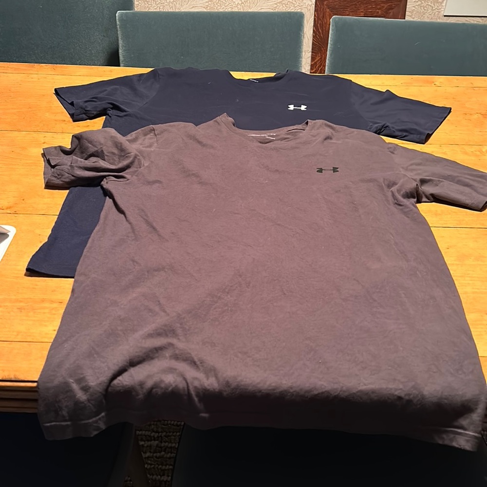 Great condition used under armor, short sleeve T-shirt, one blue and one red.